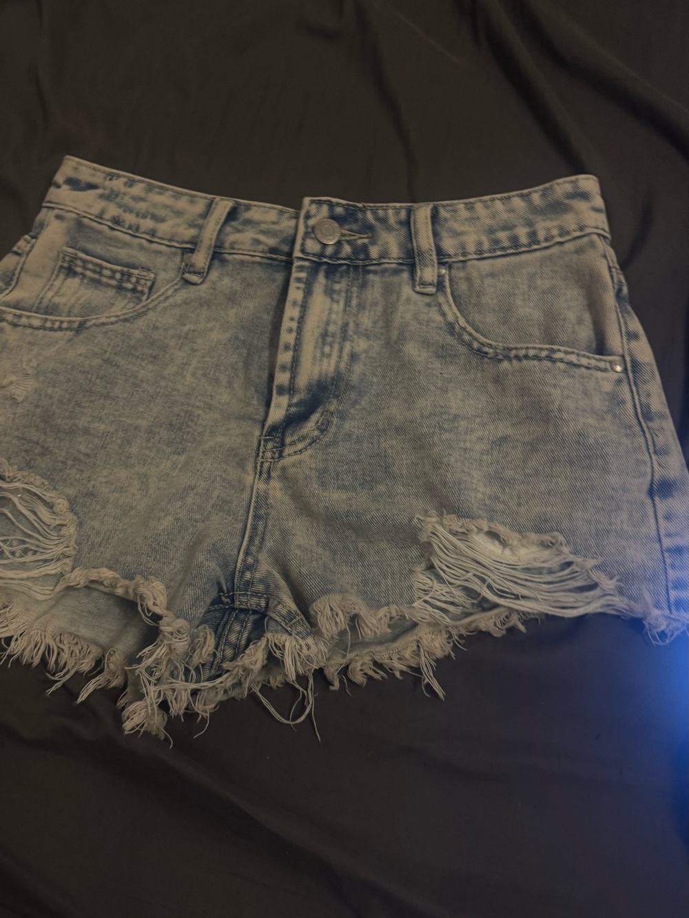 High-Rise Light Blue Distressed Denim Shorts